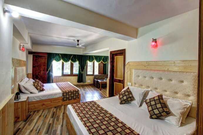 Imagen de la habitación del Hotel Goroomgo Highway Inn Manali. Foto 17