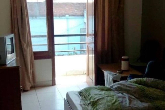 Imagen de la habitación del Hotel Goroomgo Him Plaza Almora. Foto 12