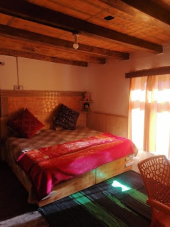 Imagen de la habitación del Hotel Goroomgo Himalaya Retreat Homestay. Foto 11