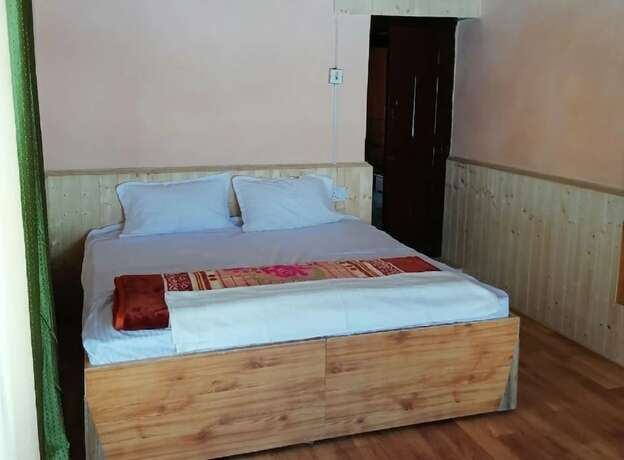 Imagen de la habitación del Hotel Goroomgo Himalaya Retreat Homestay. Foto 13