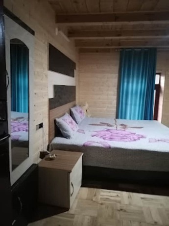 Imagen de la habitación del Hotel Goroomgo Himalaya Retreat Homestay. Foto 14