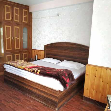 Imagen de la habitación del Hotel Goroomgo Himsutra Shimla. Foto 4