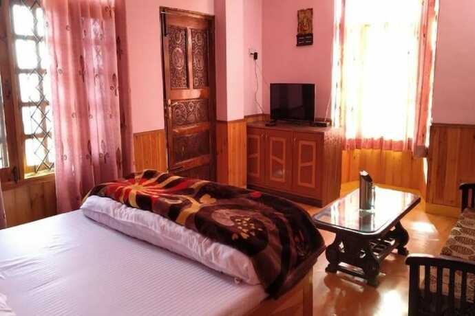 Imagen de la habitación del Hotel Goroomgo Himsutra Shimla. Foto 7