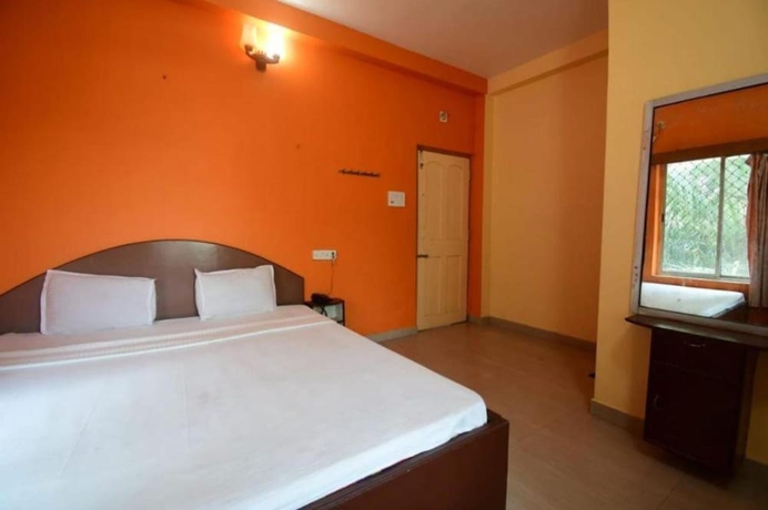 Imagen de la habitación del Hotel Goroomgo Indranil Digha. Foto 7
