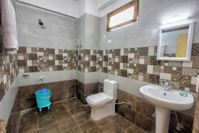 Imagen general del Hotel Goroomgo J J Regency Manali. Foto 9