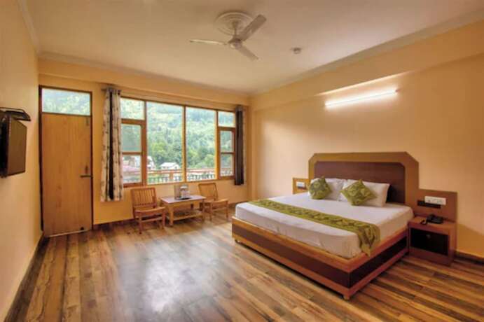 Imagen de la habitación del Hotel Goroomgo J J Regency Manali. Foto 11