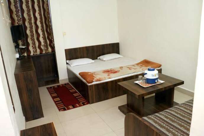 Imagen de la habitación del Hotel Goroomgo Jain Residency. Foto 8