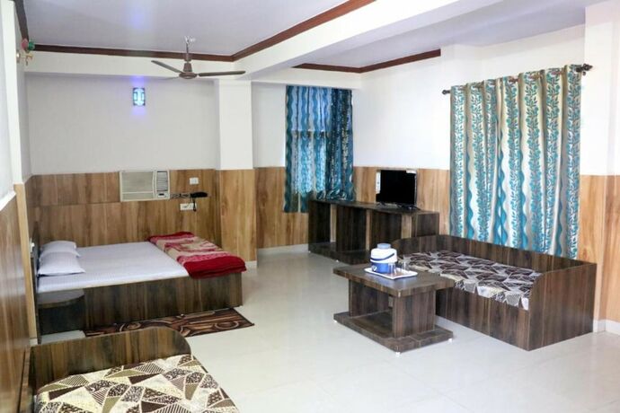 Imagen de la habitación del Hotel Goroomgo Jain Residency. Foto 11