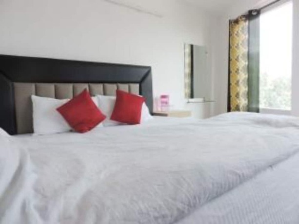 Imagen de la habitación del Hotel Goroomgo Jasmine Dalhousie. Foto 8