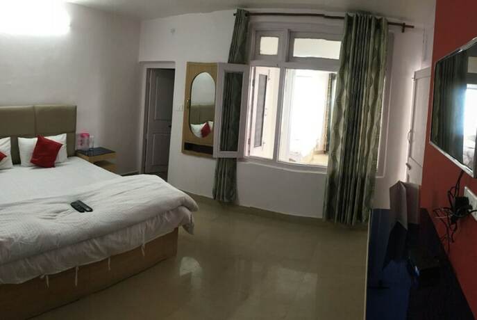 Imagen de la habitación del Hotel Goroomgo Jasmine Dalhousie. Foto 10