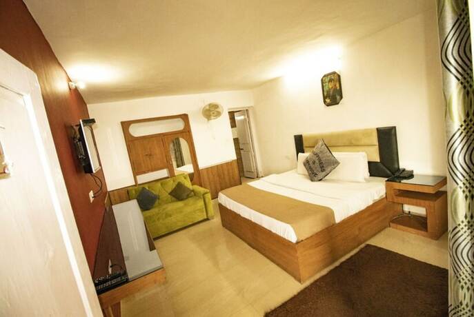 Imagen de la habitación del Hotel Goroomgo Jasmine Dalhousie. Foto 11