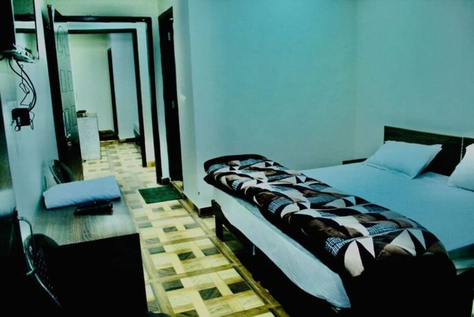 Imagen de la habitación del Hotel Goroomgo Kaafal Homestay Mussoorie. Foto 12