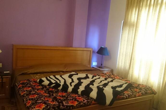 Imagen de la habitación del Hotel Goroomgo Kalara Regency Shimla. Foto 18