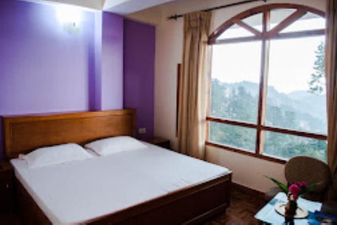 Imagen de la habitación del Hotel Goroomgo Kalara Regency Shimla. Foto 19