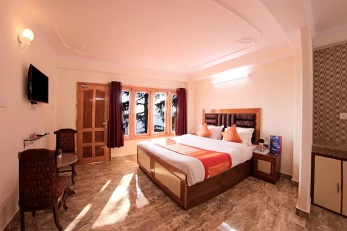 Imagen de la habitación del Hotel Goroomgo Kalara Regency Shimla. Foto 20