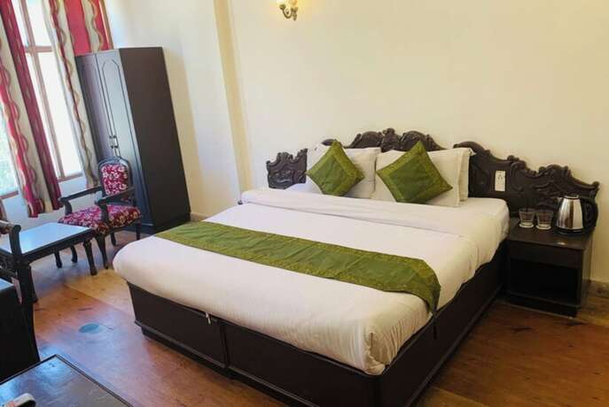 Imagen de la habitación del Hotel Goroomgo Kalinga Continental Manali. Foto 18