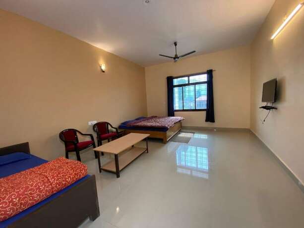 Imagen de la habitación del Hotel Goroomgo Kanara Bhimtal. Foto 10
