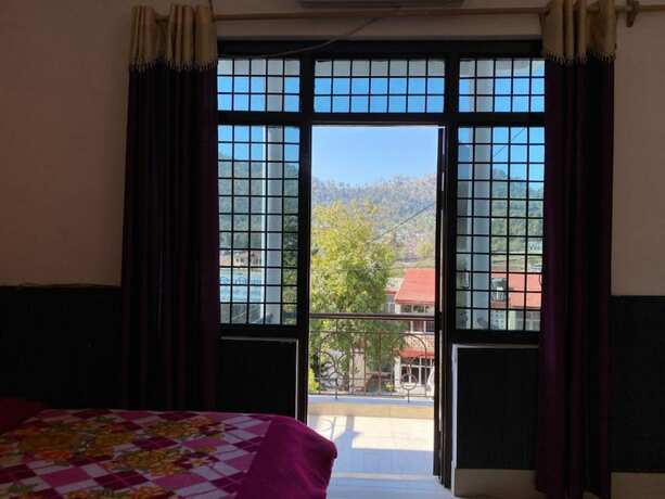 Imagen de la habitación del Hotel Goroomgo Kanara Bhimtal. Foto 12