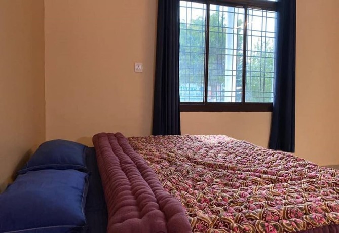 Imagen de la habitación del Hotel Goroomgo Kanara Bhimtal. Foto 16