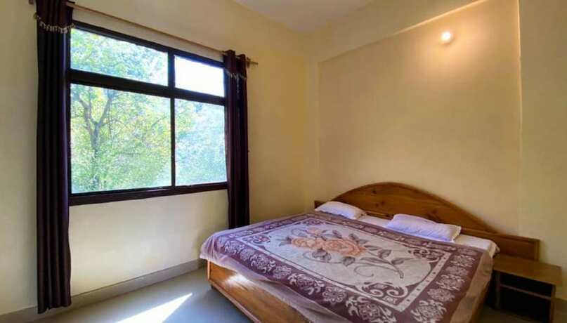 Imagen de la habitación del Hotel Goroomgo Kanara Bhimtal. Foto 17