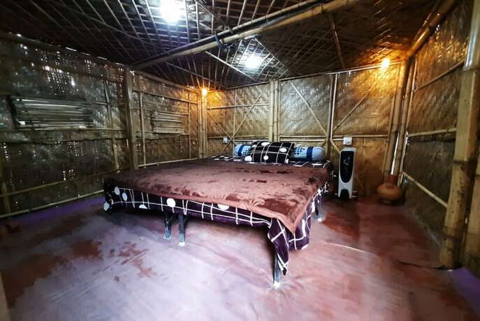 Imagen general del Hotel Goroomgo Kasol Huts Kullu. Foto 8