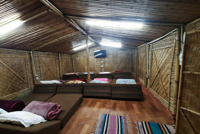 Imagen de la habitación del Hotel Goroomgo Kasol Huts Kullu. Foto 14