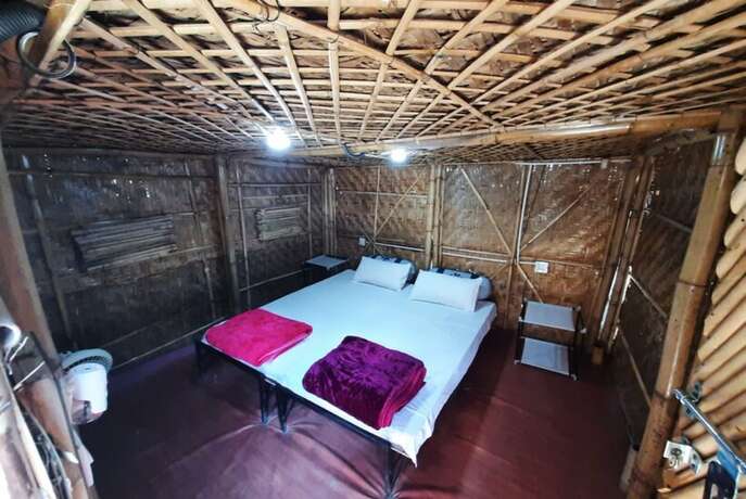 Imagen de la habitación del Hotel Goroomgo Kasol Huts Kullu. Foto 15