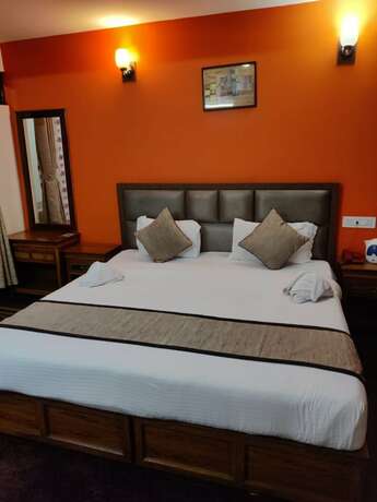 Imagen de la habitación del Hotel Goroomgo Kasturi Palace Darjeeling. Foto 8