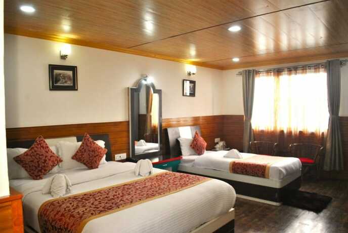 Imagen de la habitación del Hotel Goroomgo Kasturi Palace Darjeeling. Foto 13