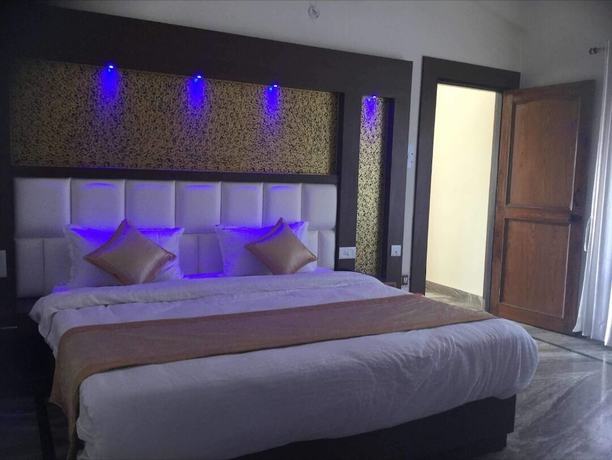 Imagen de la habitación del Hotel Goroomgo Kavyansh Villa Bhimtal. Foto 5