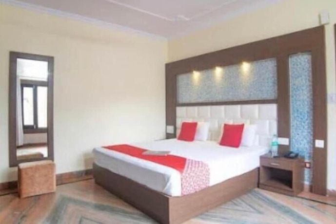 Imagen de la habitación del Hotel Goroomgo Kavyansh Villa Bhimtal. Foto 6