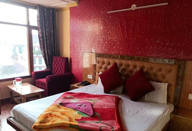 Imagen de la habitación del Hotel Goroomgo King Palace Shimla. Foto 18