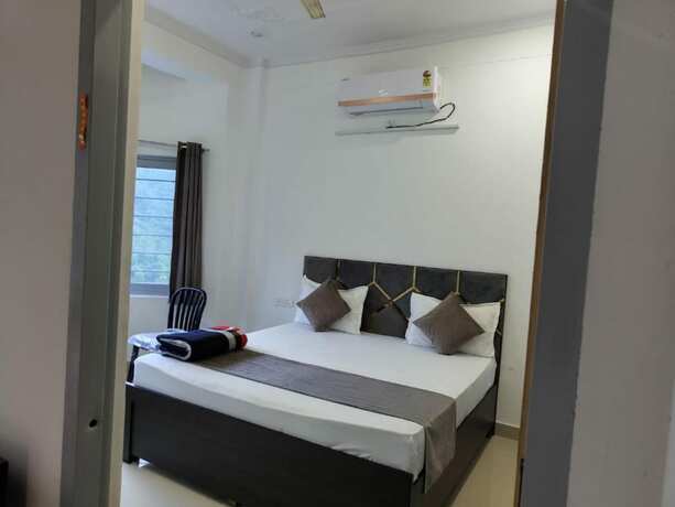 Imagen de la habitación del Hotel Goroomgo Komfy Stayz Dehradun. Foto 13