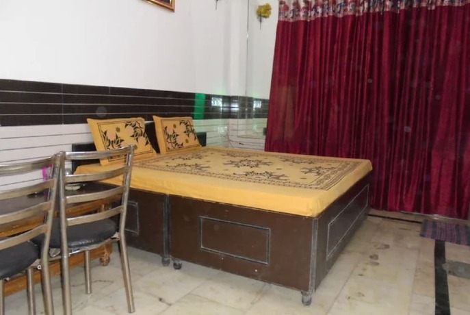 Imagen de la habitación del Hotel Goroomgo Labh Mahal Meerut. Foto 10