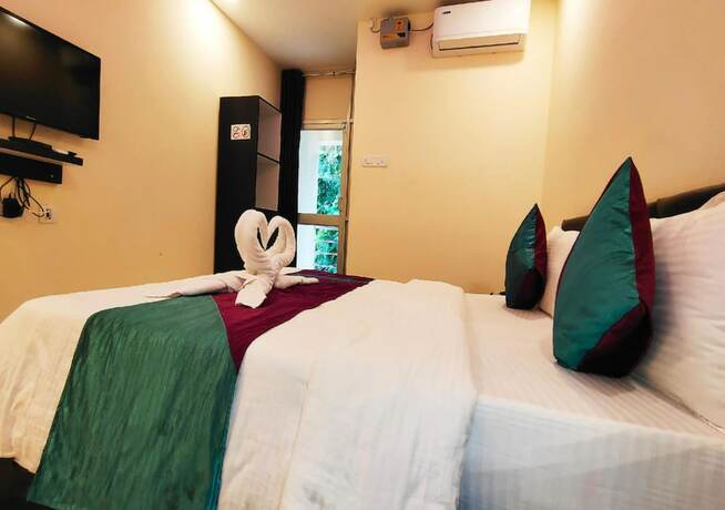 Imagen de la habitación del Hotel Goroomgo Luxury Star Inn Sum Hospital Bhubaneswar. Foto 13