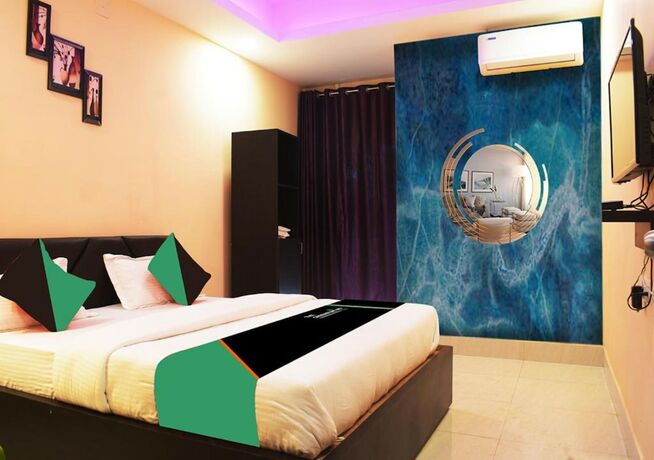 Imagen de la habitación del Hotel Goroomgo Luxury Star Inn Sum Hospital Bhubaneswar. Foto 14