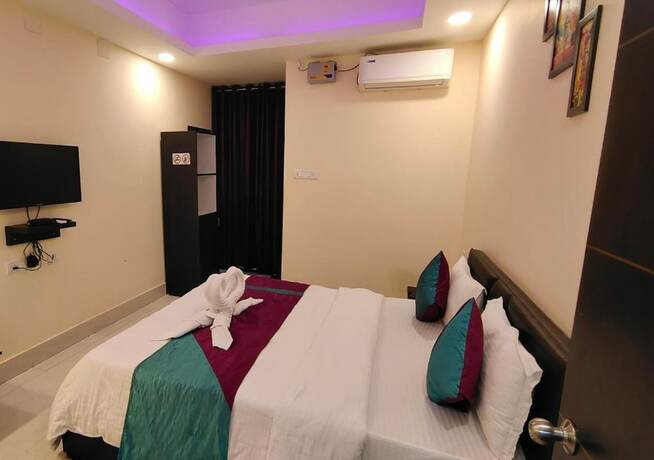 Imagen de la habitación del Hotel Goroomgo Luxury Star Inn Sum Hospital Bhubaneswar. Foto 16