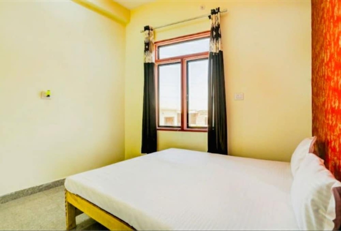 Imagen de la habitación del Hotel Goroomgo M J Agra. Foto 9