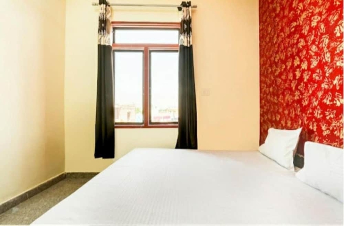 Imagen de la habitación del Hotel Goroomgo M J Agra. Foto 10