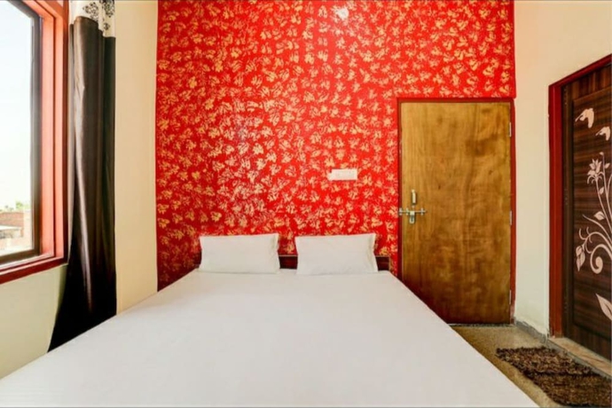 Imagen de la habitación del Hotel Goroomgo M J Agra. Foto 11