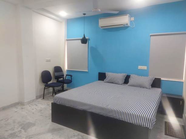 Imagen de la habitación del Hotel Goroomgo M M Howrah Home Stay Kolkata. Foto 4