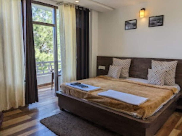 Imagen de la habitación del Hotel Goroomgo MS Shepheard Hills Resort. Foto 17