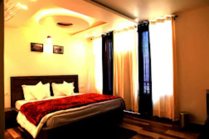 Imagen de la habitación del Hotel Goroomgo MS Shepheard Hills Resort. Foto 18