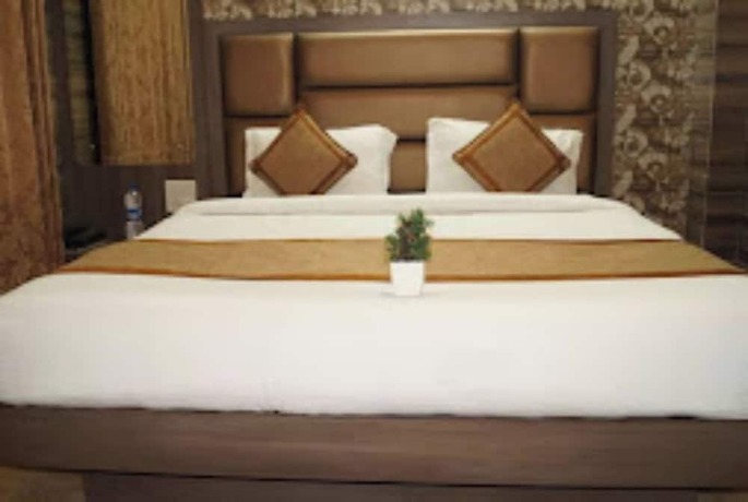 Imagen de la habitación del Hotel Goroomgo Madhu Palace Katra. Foto 11