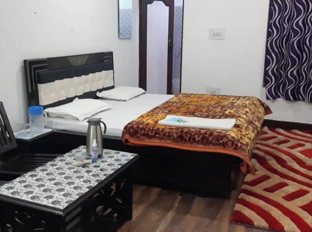 Imagen de la habitación del Hotel Goroomgo Madhu Palace Katra. Foto 13