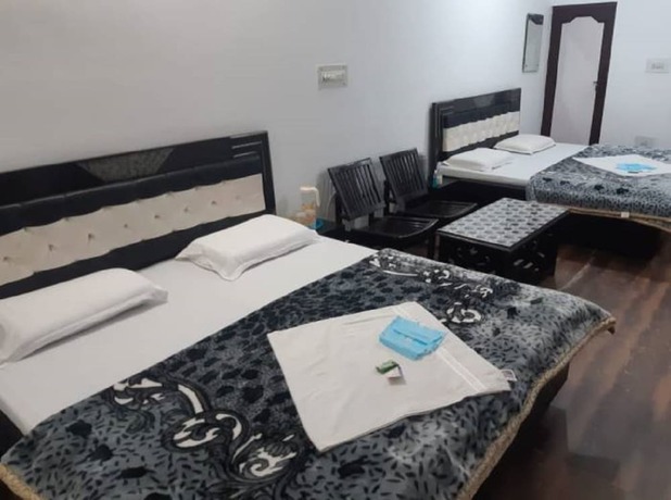 Imagen de la habitación del Hotel Goroomgo Madhu Palace Katra. Foto 14