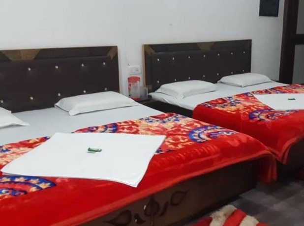 Imagen de la habitación del Hotel Goroomgo Madhu Palace Katra. Foto 15