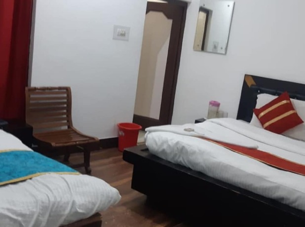 Imagen de la habitación del Hotel Goroomgo Madhu Palace Katra. Foto 17