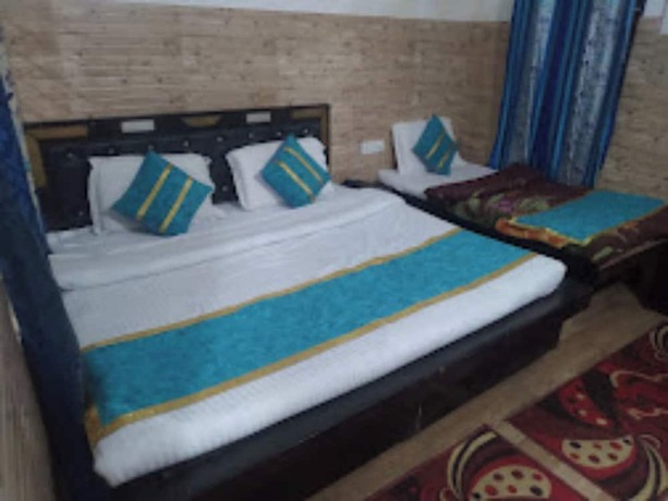 Imagen de la habitación del Hotel Goroomgo Madhu Palace Katra. Foto 18