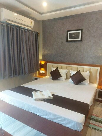 Imagen de la habitación del Hotel Goroomgo Marine Blue Digha. Foto 19